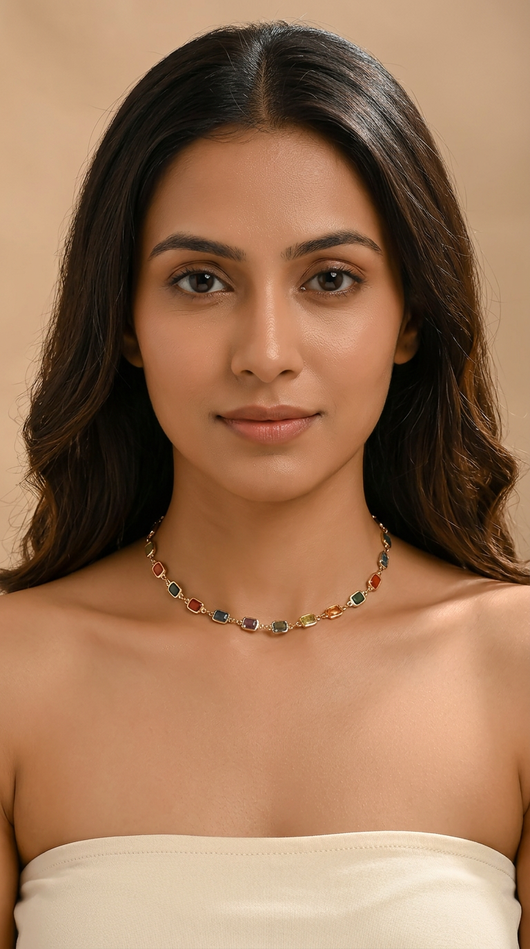 Trove Colombo Acacia necklace featuring multi-colored synthetic gemstones on a polished gold-tone stainless steel chain