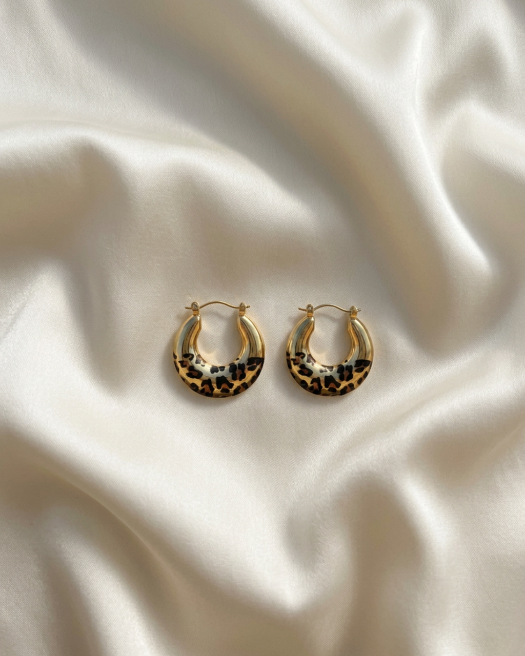 Trove Colombo Elara hoop earrings featuring a vintage-inspired leopard print pattern