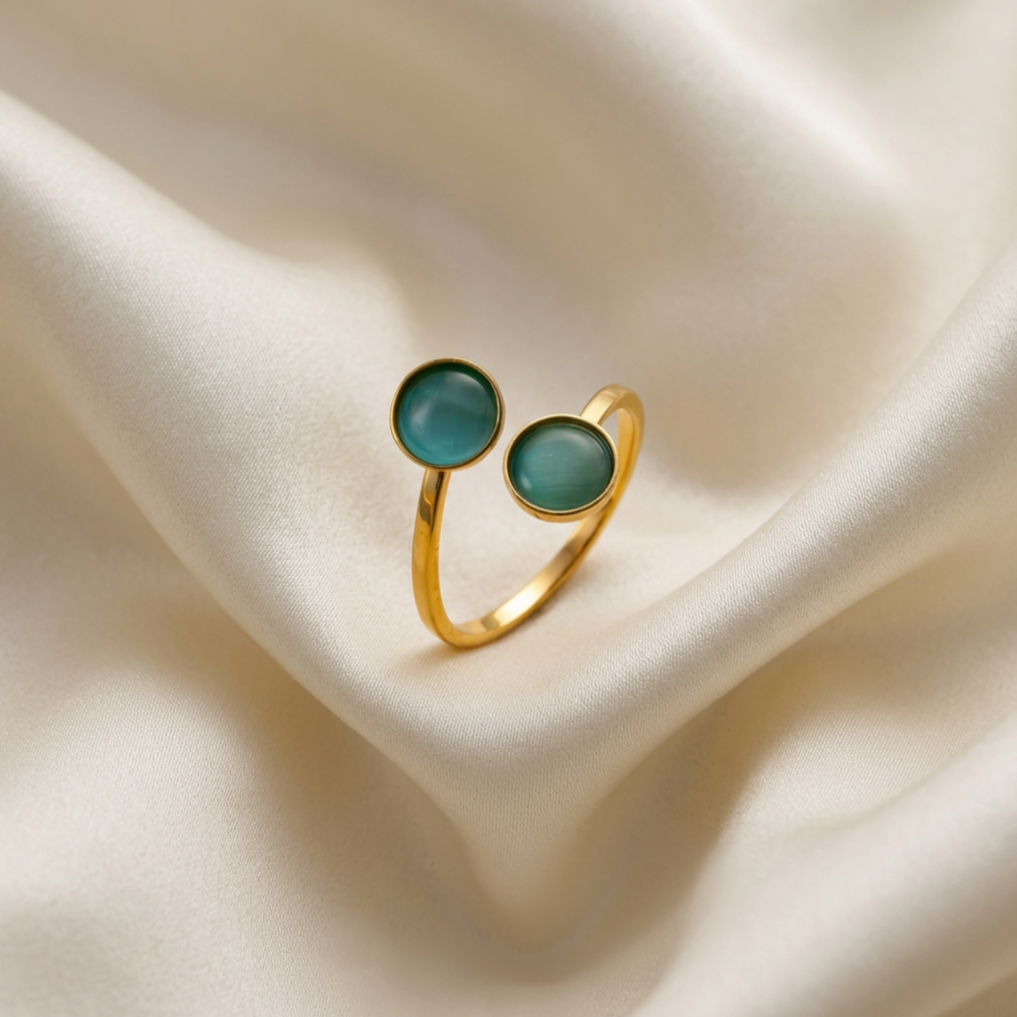 Trove Colombo Velora 18K gold-plated stainless steel ring with two round green cat's eye stones