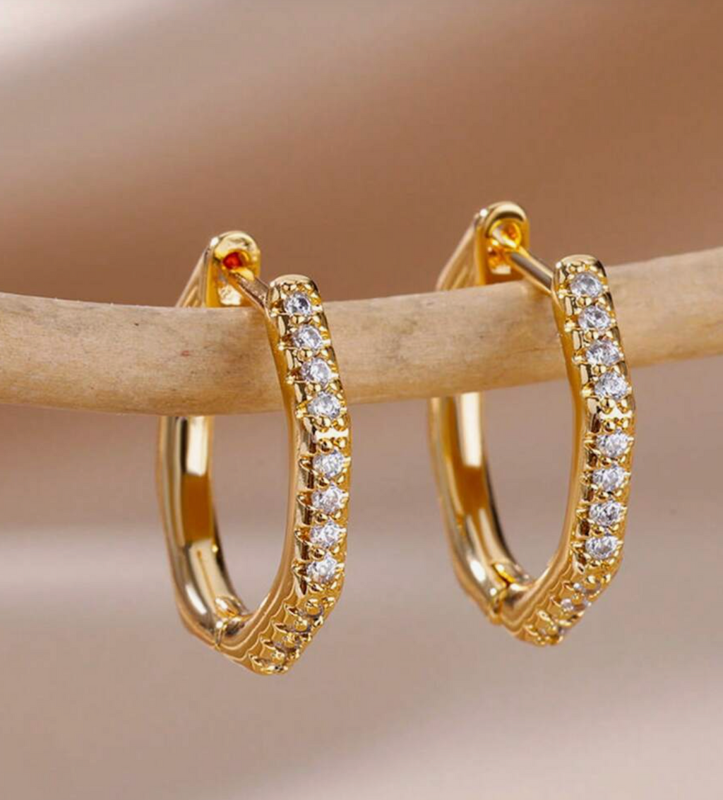 Trove Colombo Alina Zirconia gold hoop earrings with delicate crystal embellishments.
