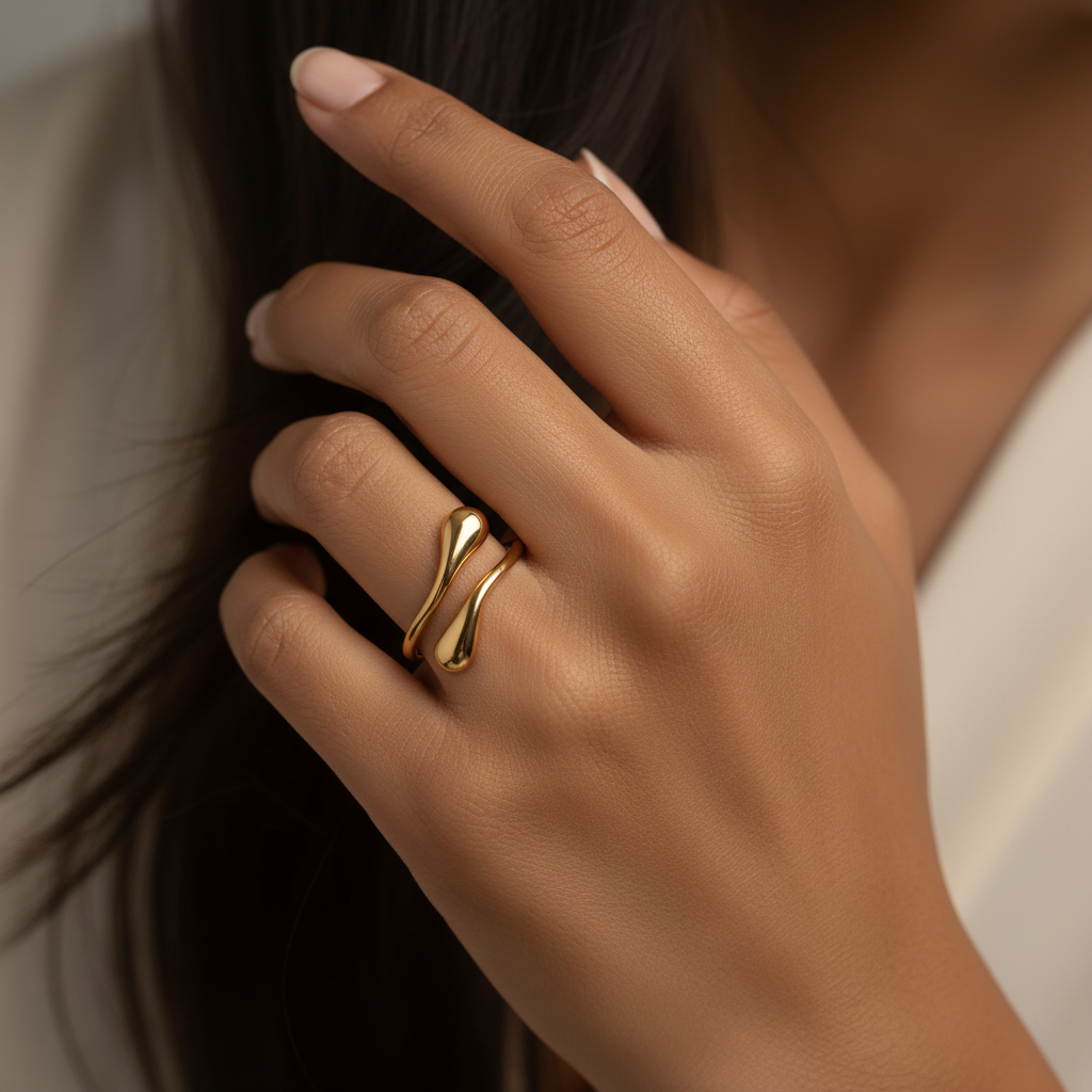 Trove Colombo Astria 18K gold-plated stainless steel ring with a minimalist open-ended teardrop design