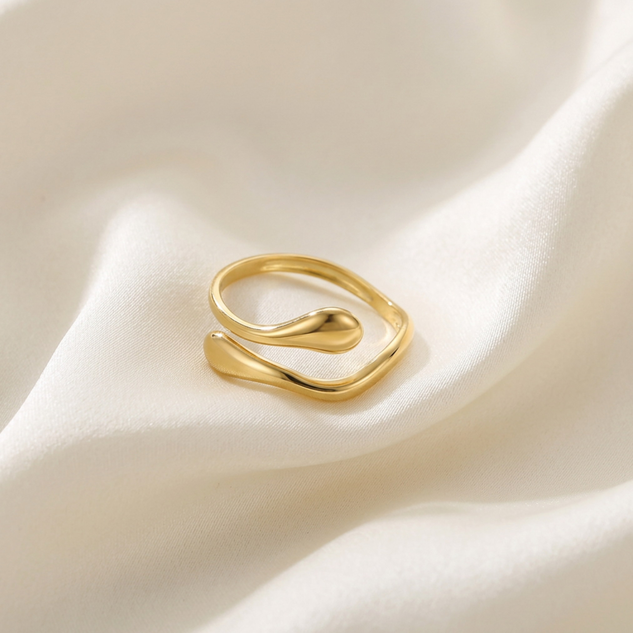 Trove Colombo Astria 18K gold plated stainless steel ring with a minimalist open wrap design