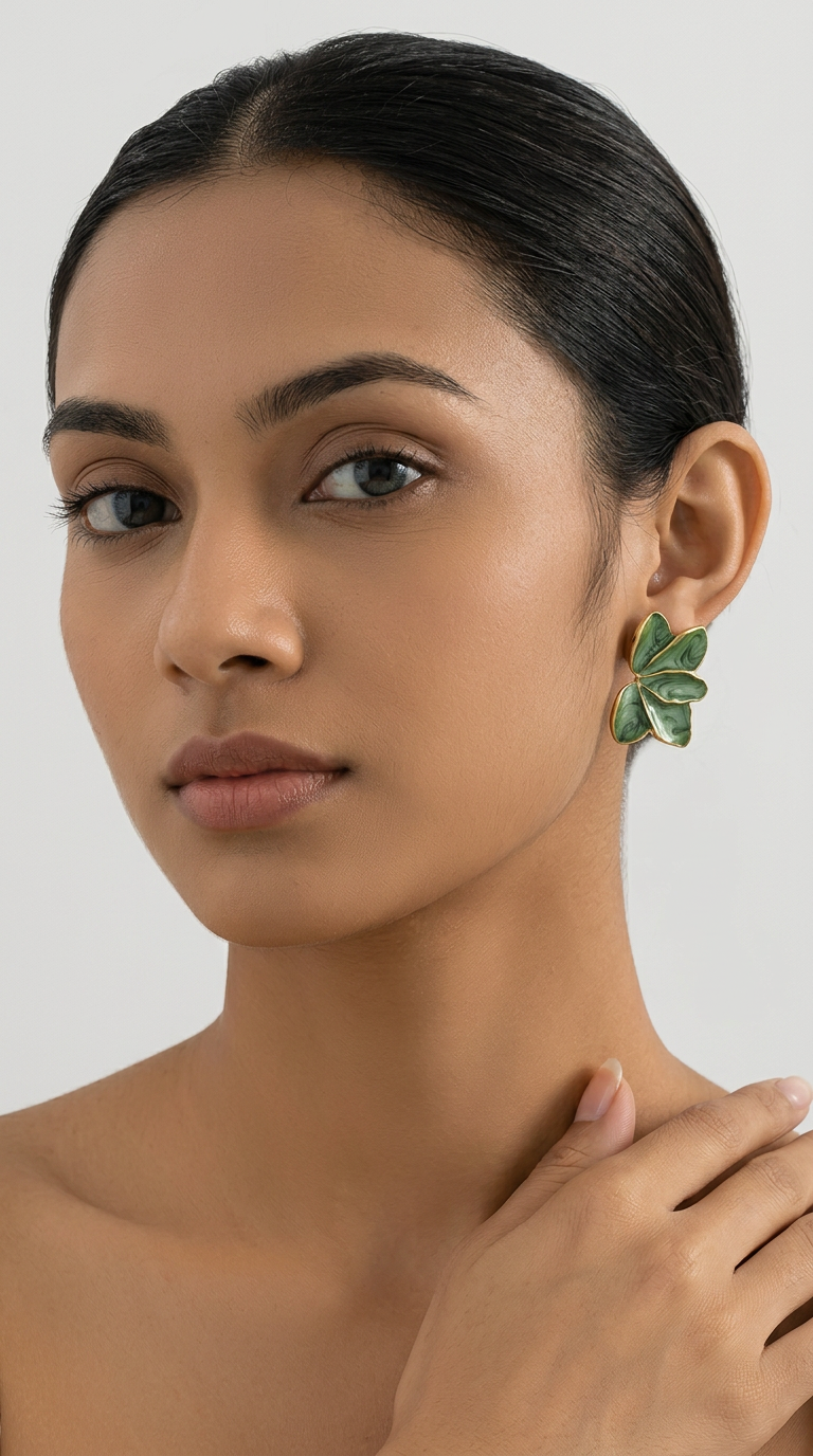 Trove Colombo Calista gold-plated earrings with green resin leaf design