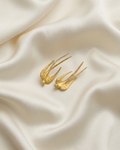 Trove Colombo Cassienne 18K gold plated zinc alloy earrings featuring an elegant bird design