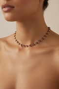 Trove Colombo Cheryl necklace featuring a delicate gold chain with small red and green cherry-inspired beads