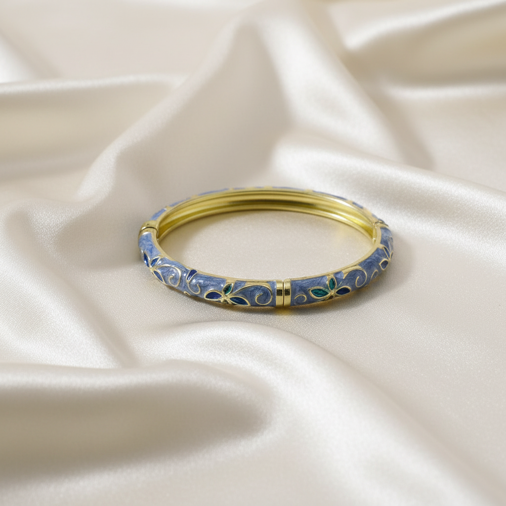 Trove Colombo Emily 18K gold plated bangle featuring blue enamel floral patterns