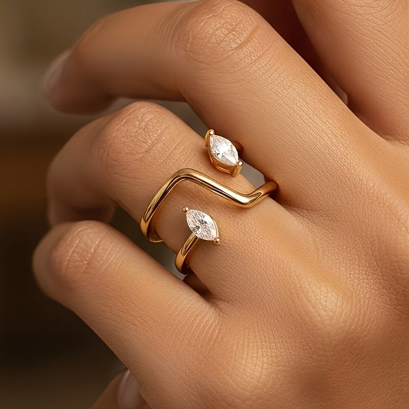 Trove Colombo Halley 18K gold-plated copper ring with a modern open design and two marquise-cut clear stones.