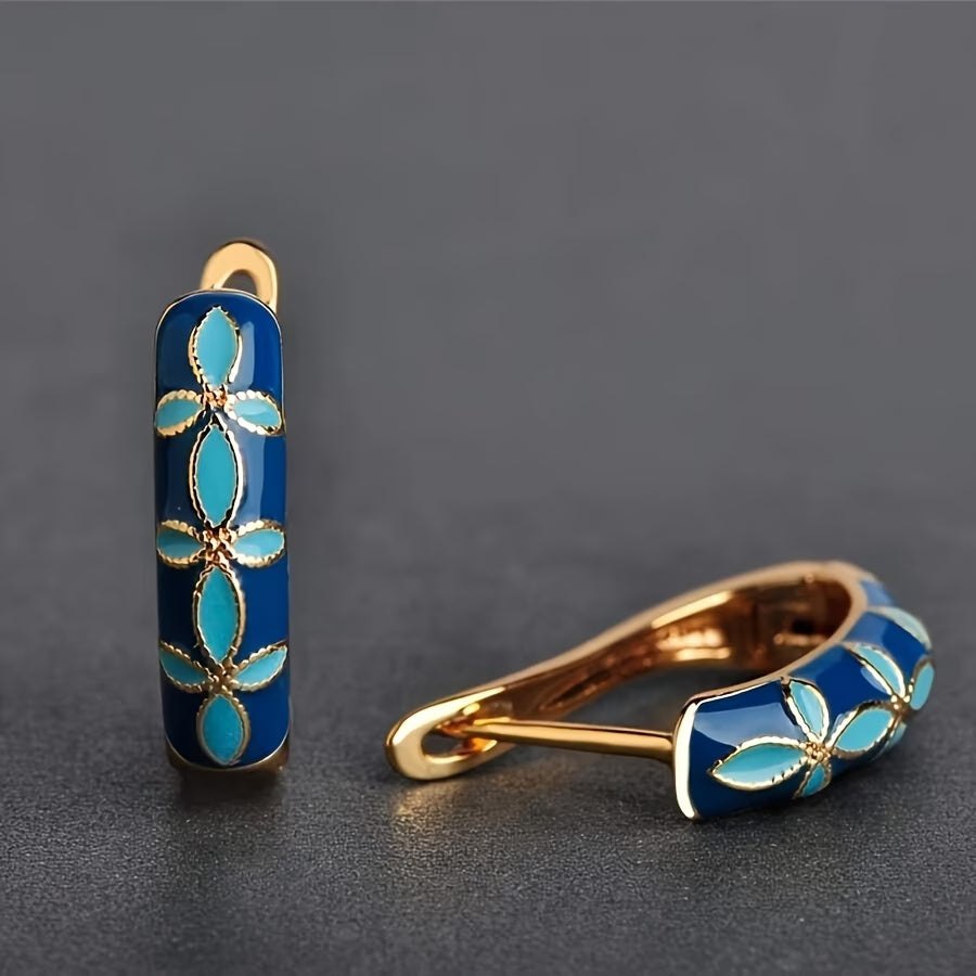 Trove Colombo Lucia vintage royal hoop earrings in KC gold plated copper with blue and turquoise floral enamel inlay.