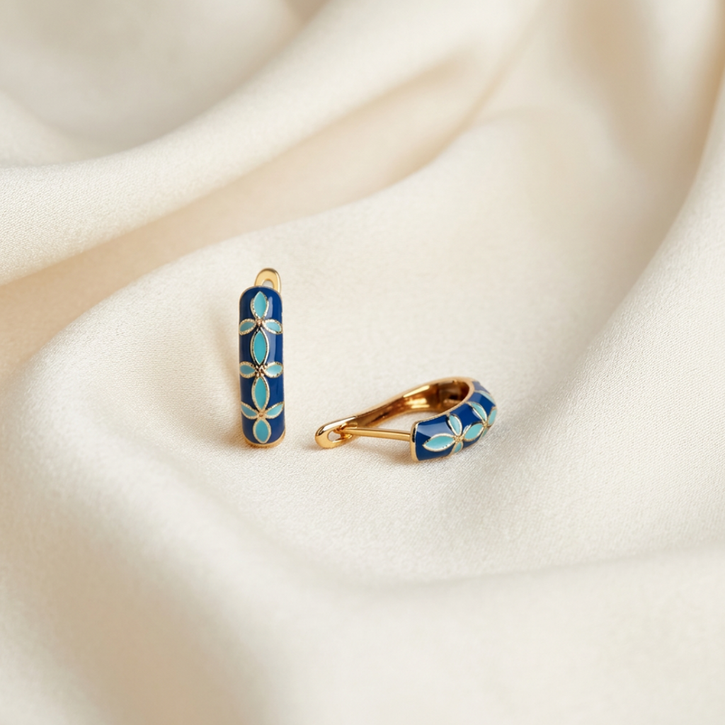 Trove Colombo Lucia KC gold-plated hoop earrings featuring a vintage royal blue and turquoise floral enamel design.