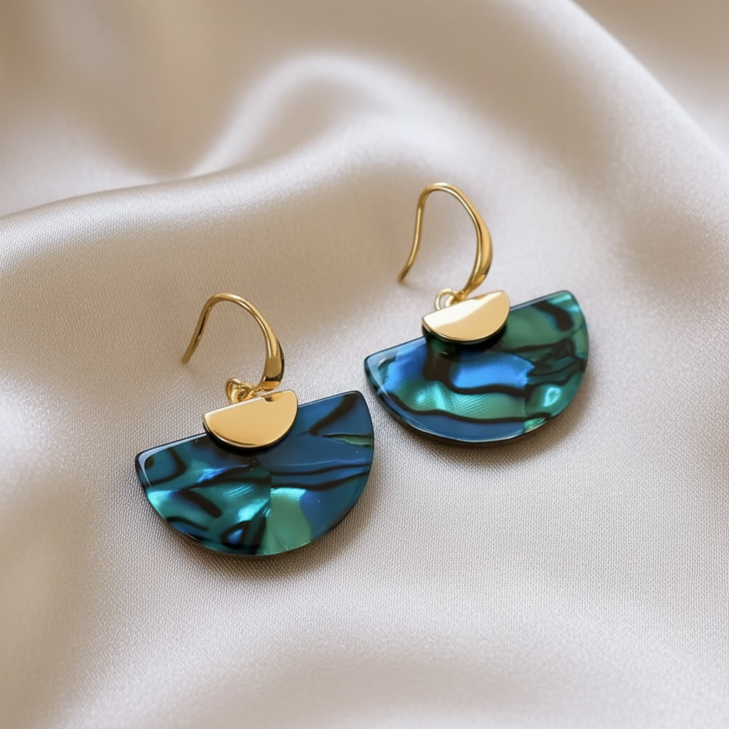 Trove Colombo Romilly boho chunky earrings featuring semi-circular teal and blue marbled resin with gold accents
