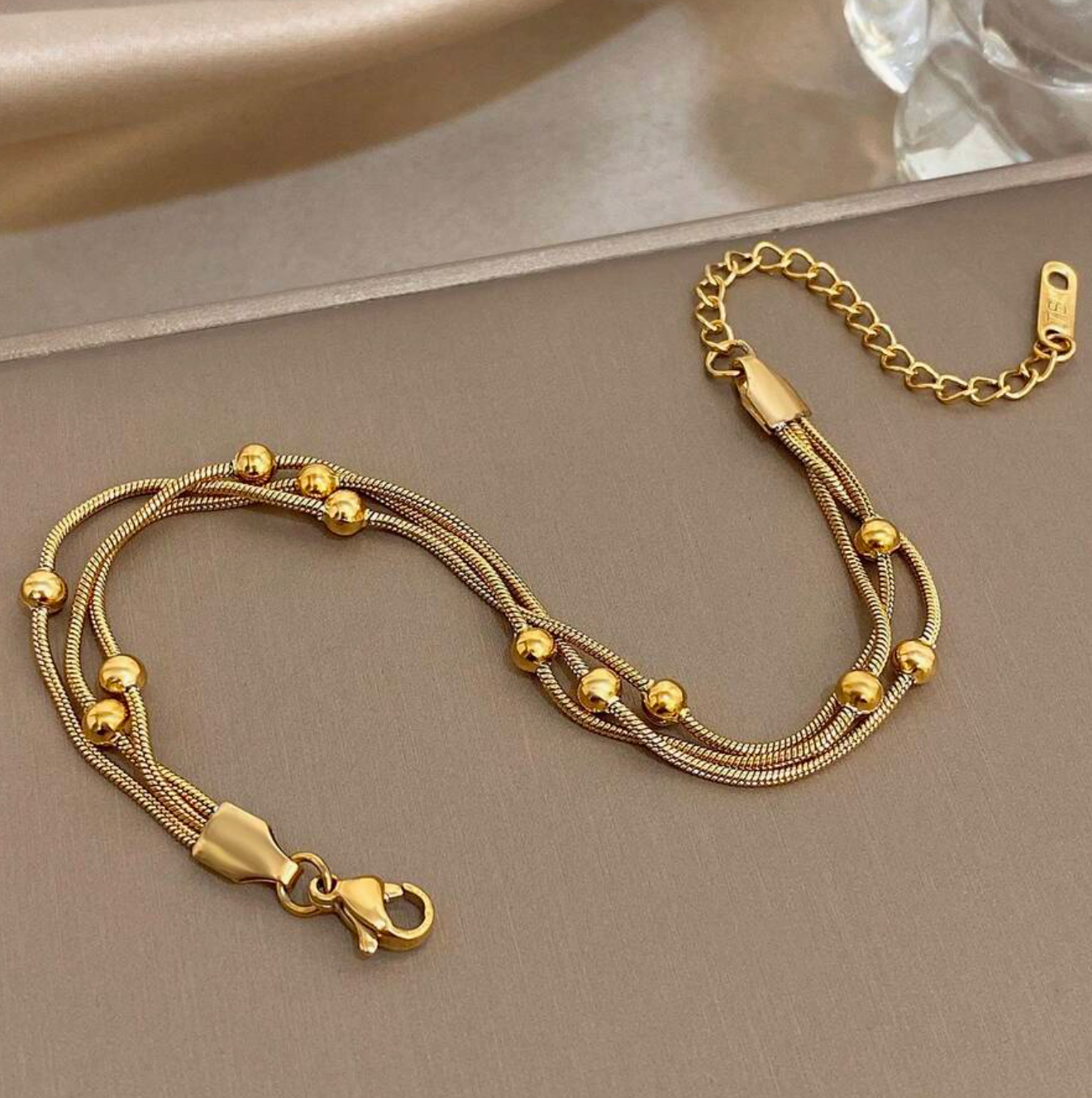Trove Colombo 18K gold plated stainless steel Seraphina bracelet with delicate chain and bead