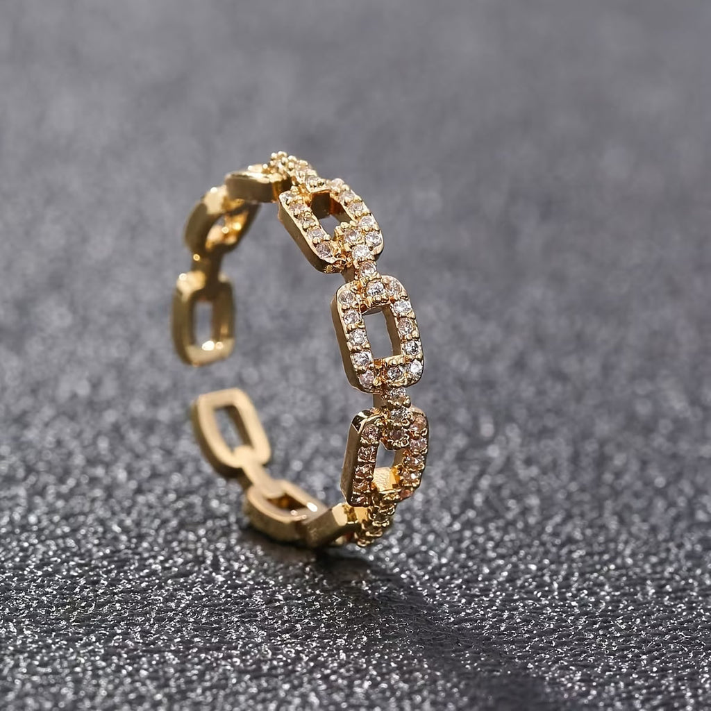 Trove Colombo Vespera 18K gold-plated copper ring featuring a sparkling cubic zirconia