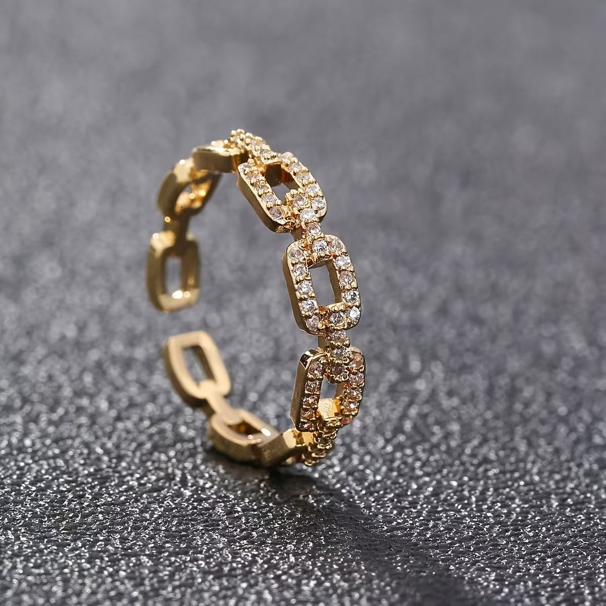 Trove Colombo Vespera 18K gold-plated copper ring featuring a sparkling cubic zirconia
