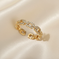 Trove Colombo Vespera 18K gold-plated copper chain ring featuring sparkling cubic zirconia stones